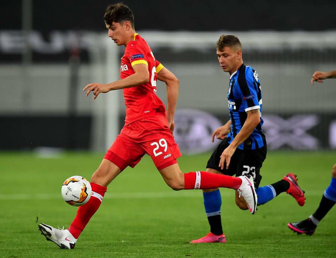Nicoló Barella of Inter chases Kai Havertz of Leverkusen - both scored a goal in the Nerazzurri's 2-1 win over the Germans