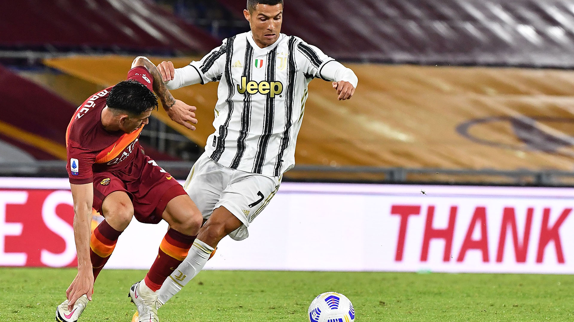 Cristiano Ronaldo, here faced by Rogez Ibanez, once again pulled Juventus' chestnuts out of the fire