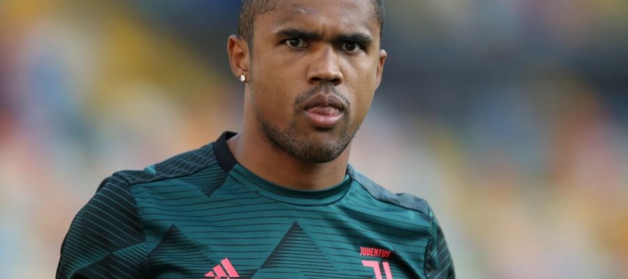 Juventus' Douglas Costa had been linked with a move to Man United but the Brazilian wants to fight for his place in Andrea Pirlo's side