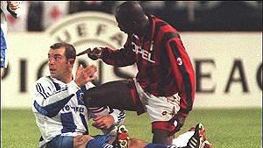 The last time that Porto received Milan for a Champions League game is remembered for George Weah delivering a headbutt to Portuguese defender Jorge Costa