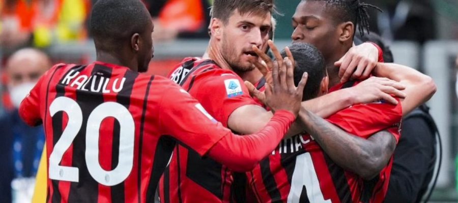 Rafael Leao scored a phenomenal one-touch volley as Milan moved back into first place with a 2-0 win over the lifeless Genoa