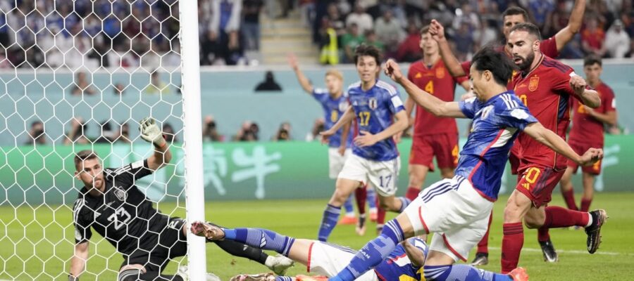 Japan and Spain qualified to the knockouts as the Samurai Blue came from behind to beat Luis Enrique's side 2-1 to grab the first place in the pool