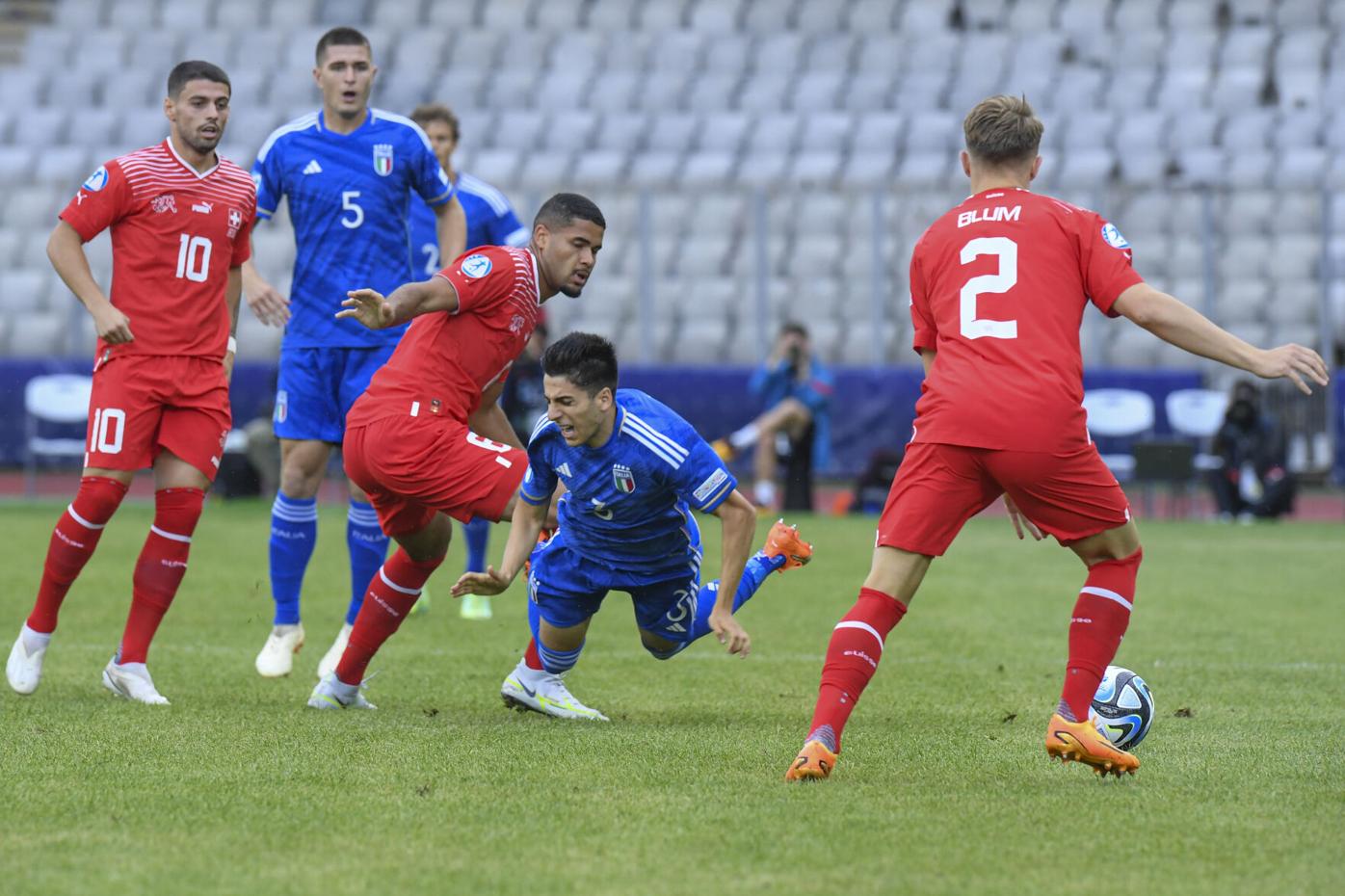 Paolo Nicolato's Italy U-21 caught their first win in the European Championship as they survived Switzerland's comeback to hold to a 3-2 success